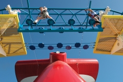 Guests aboard the Carnival Horizon navigate a ropes course in SportsSquare that also features mini golf and the beginning and ending of SkyRide and other activities. Photo by Andy Newman/Carnival Cruise Line