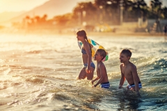 Children are having fun on beach. Andalusia, Costa del Sol, Spain Children are aged 7 and 11.