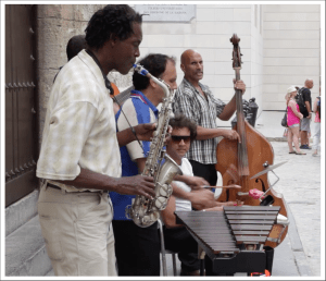 Musicians play in a Shoreside Scene from Cuba