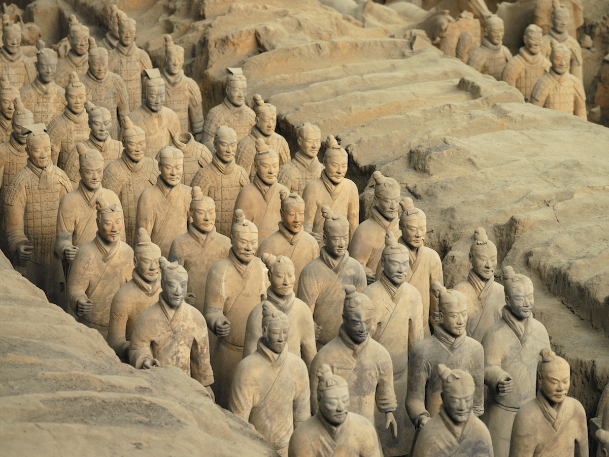 The Terracotta Army near the city of Xian in Shaanxi province in the People's Republic of China. The Terracotta Army is a collection of terracotta sculptures depicting the armies of Qin Shi Huang, the first Emperor of China. The figures, dating from 3rd century BC, were discovered in 1974 by some local farmers.