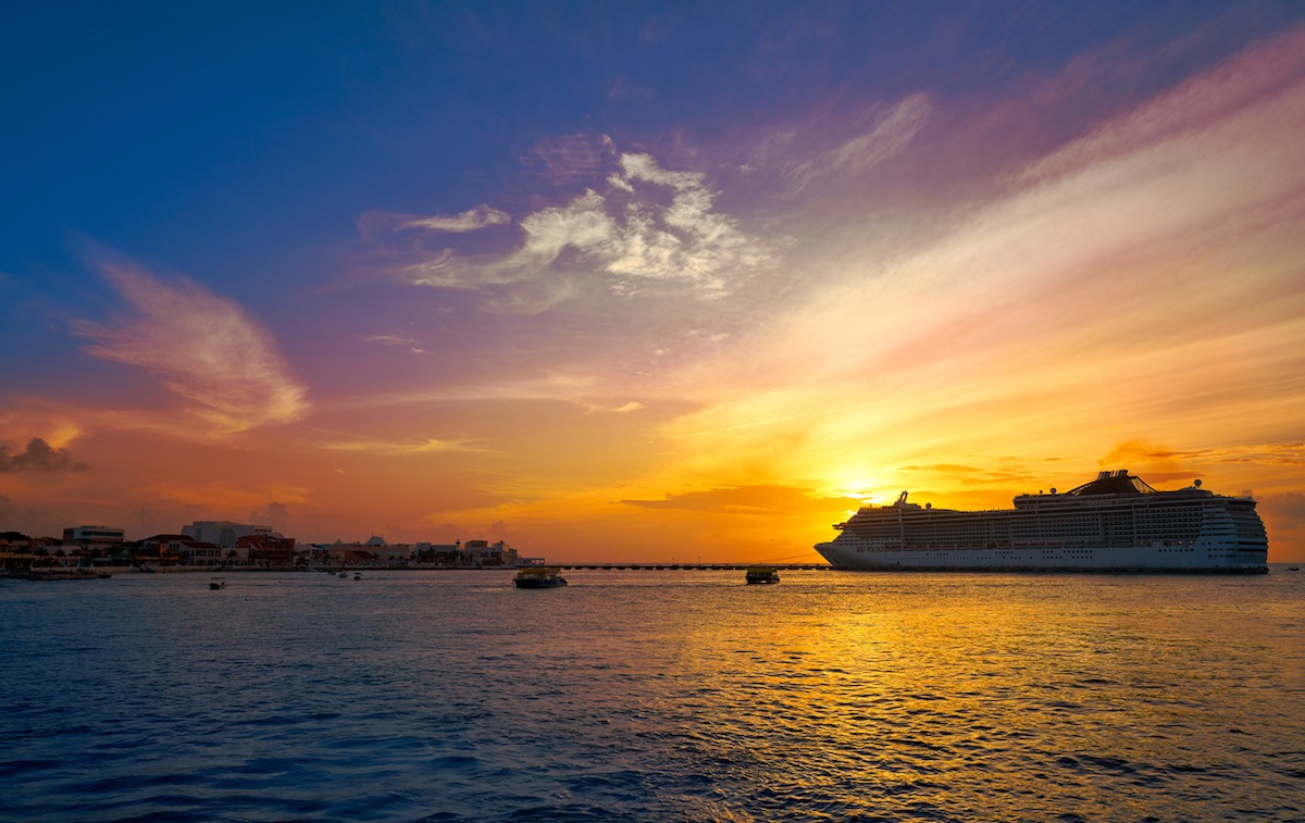 Cruise ship off Cozumel at sunset, cruising the Riviera Maya, Mexico. Photo: Ingram Image