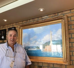 Stephen Card in front of his portrait of Carnival Triumph entering Messina, which it never really did but we won't tell. 