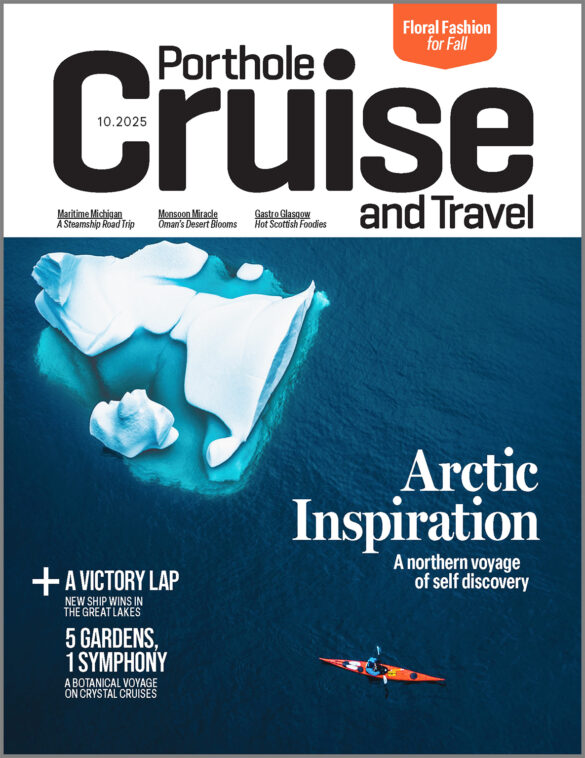 A kayaker paddles past an iceberg on a blue-and-white Porthole magazine cover under the words "Arctic Inspiration: a northern voyage of self discovery"